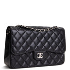 CHANEL Jumbo Double Flap - Quilted Caviar - Black